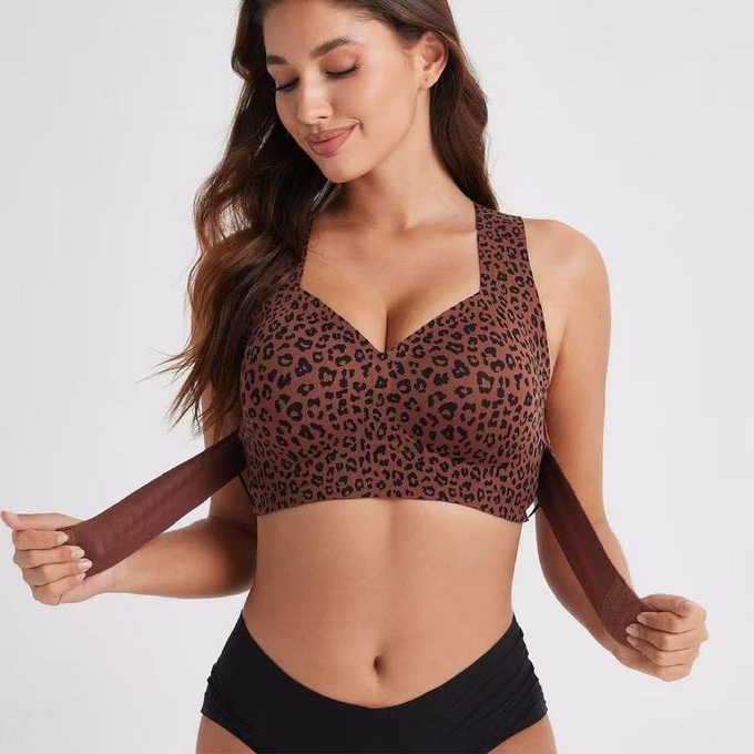 Leopard print posture bra, front view, showing the front hook closure and wide straps