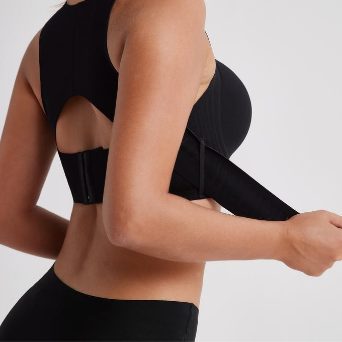 Back view showing the criss-cross support panel and front hook closure